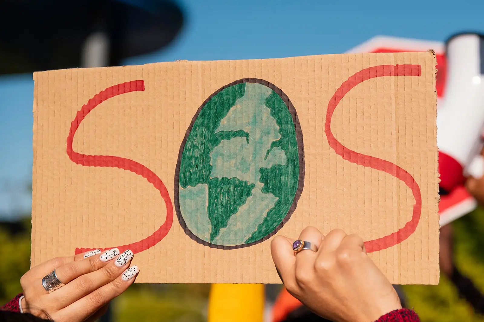 Placa de protesto e conscientização de ajuda ao planeta
